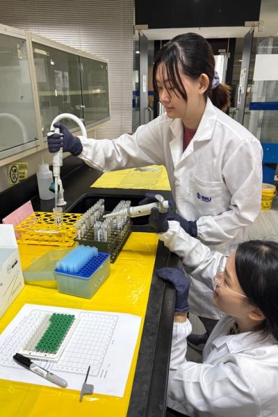 Gladys and friend in lab