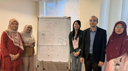Dr Wong Ting Xuan (third from left) engaging in an insightful group discussion.