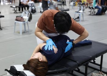 Sean providing chiropractic treatment