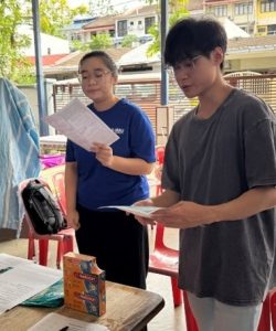 Students explaining about vitamins