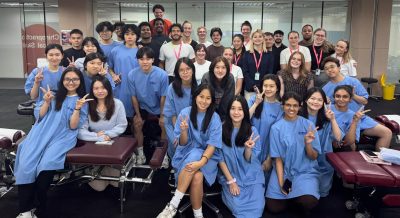 Learning in action—students at IMU Chiropractic Clinical Skills Lab building essential clinical skills.