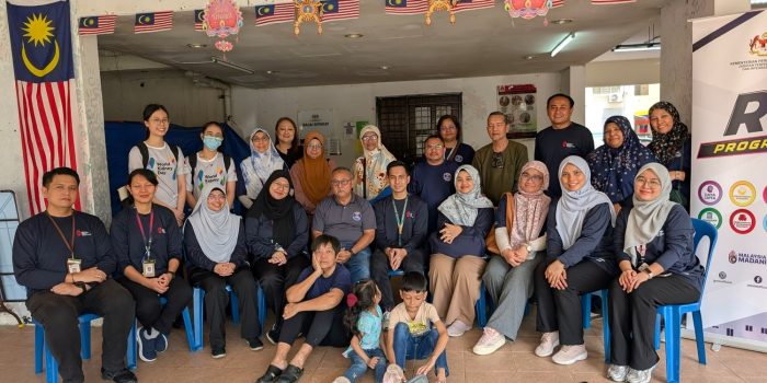 Group photo of NKF staff with PPR Desa Rejang community representatives
