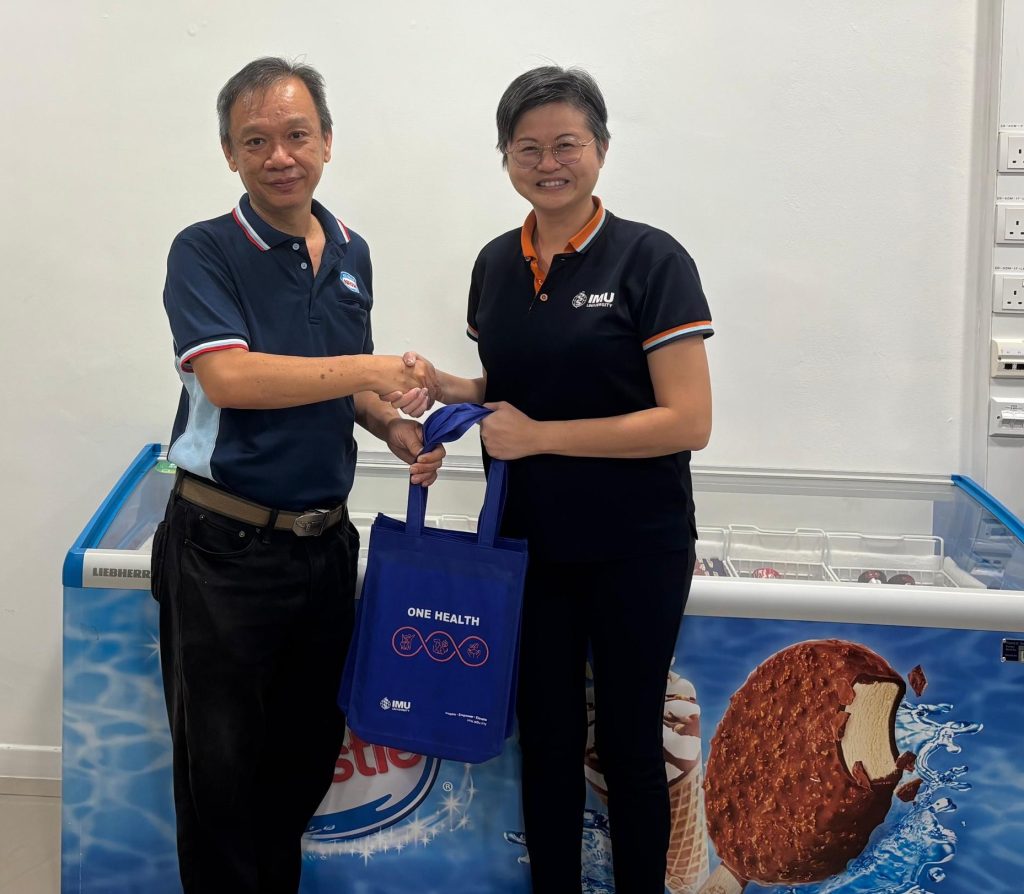 Souvenir presentation to Mr Sim