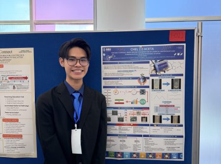 Xu Hoe with poster Xu Hoe with poster